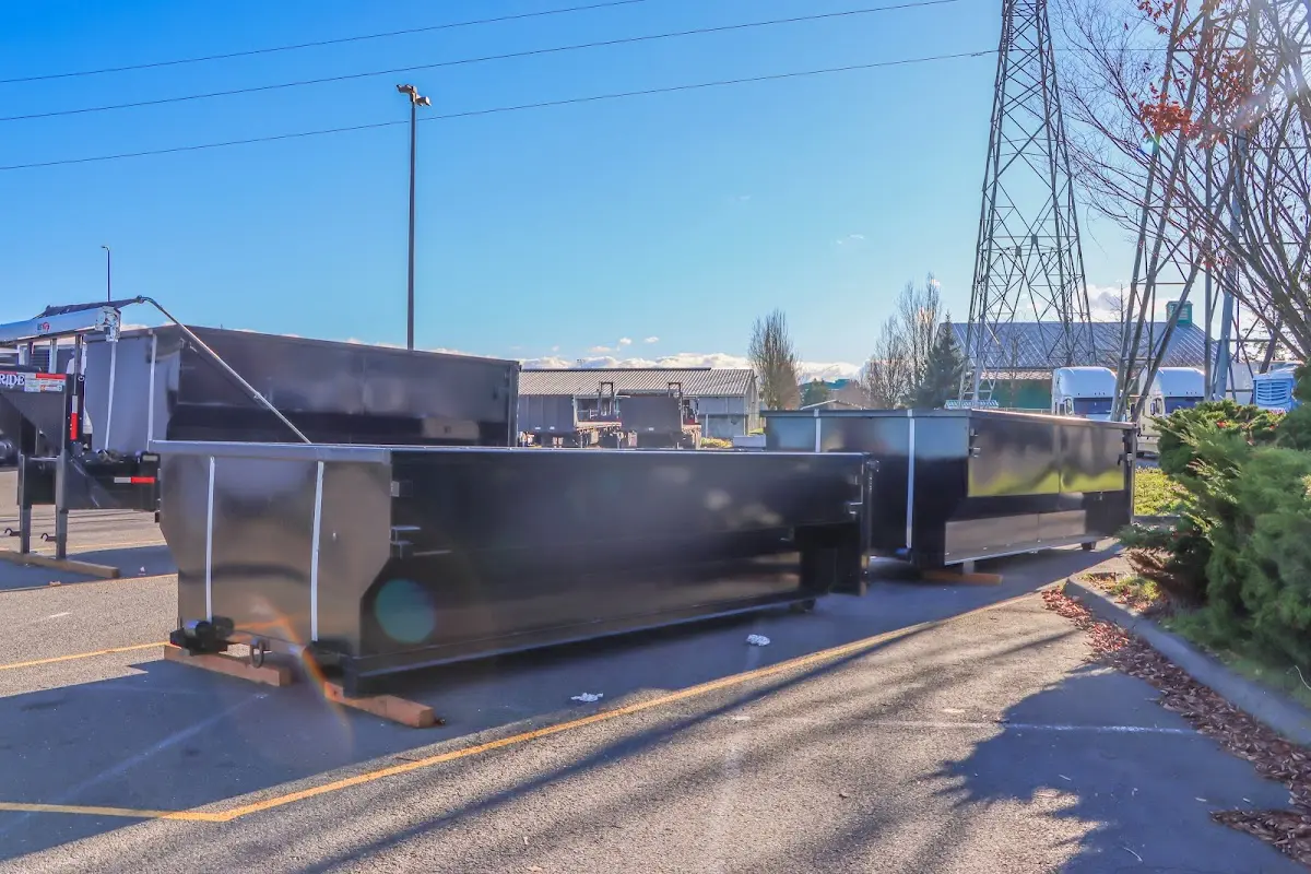 Roll-off dumpster ready for waste disposal at job site for Concrete Dumpster Rental in Larchmont